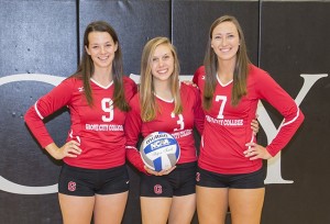 Galens (far right), with GC volleyball seniors Libbie Casey and Amy Trageser.